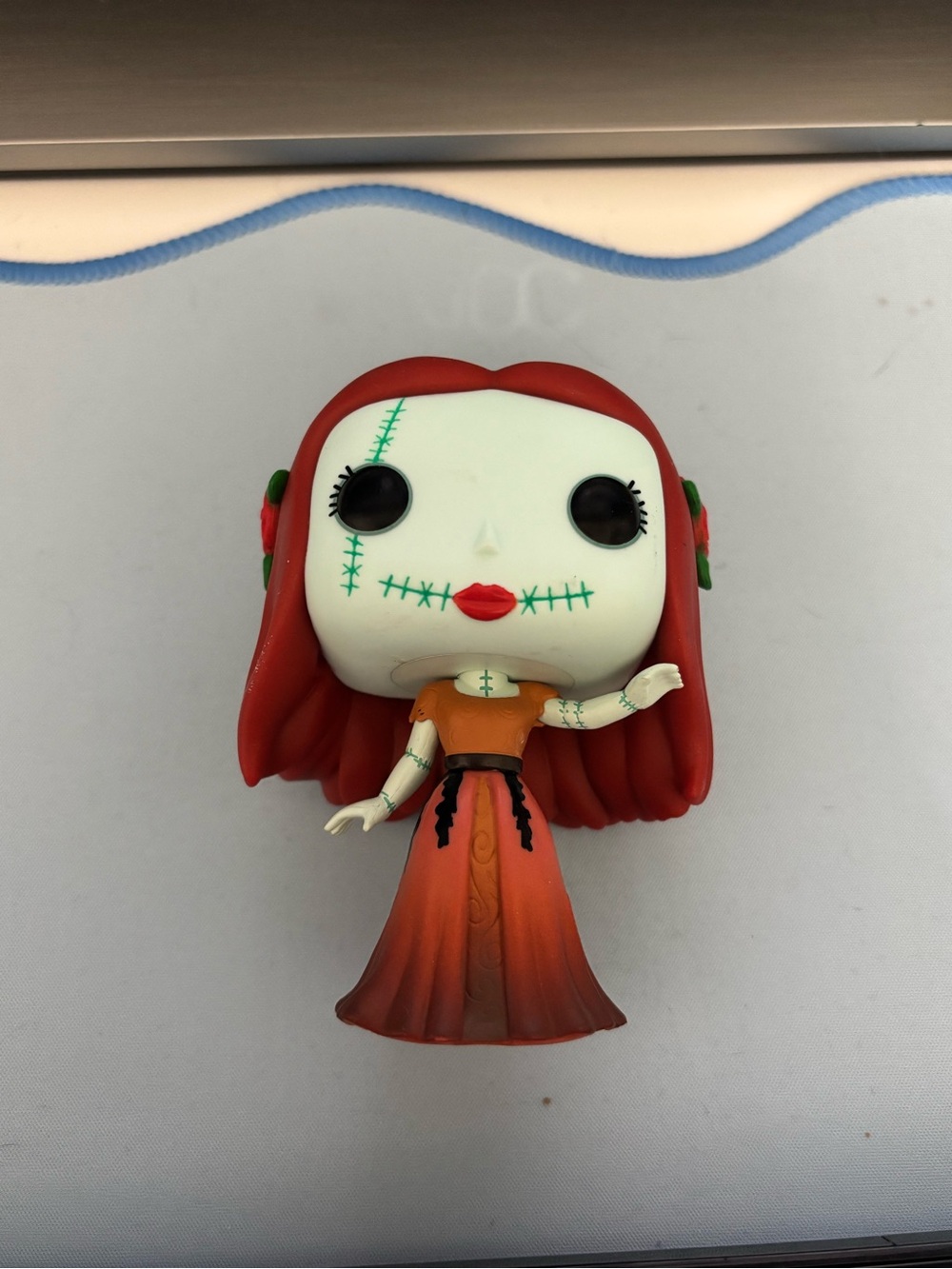 Funko Sally Figure - Red Hair, Orange Dress, Pale Green Skin